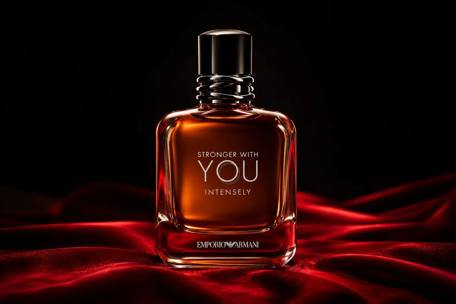Editorial image of Armani Stronger With You Intensely on red silk