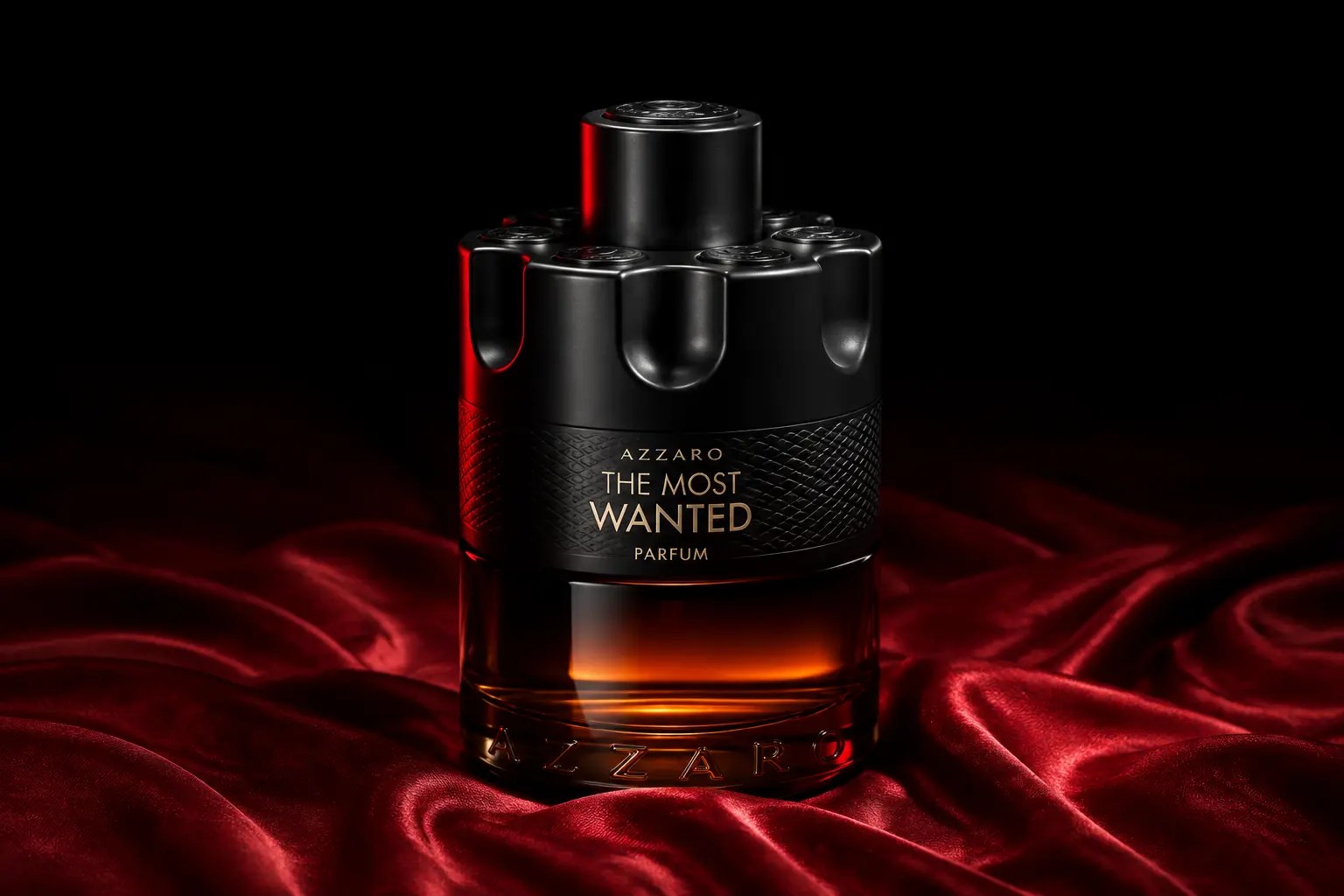 Editorial image of Azzaro The Most Wanted Parfum on red silk