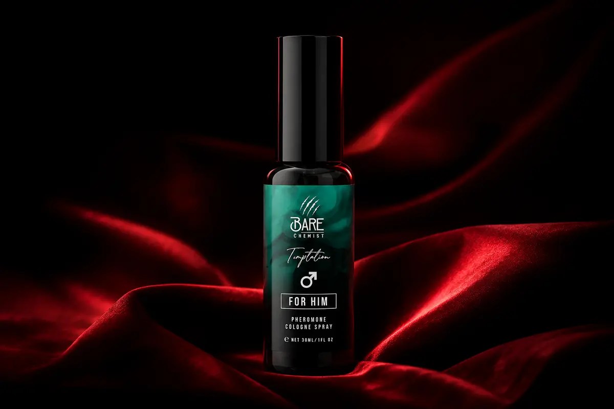 Bare Chemist Temptation pheromone cologne bottle displayed on red silk